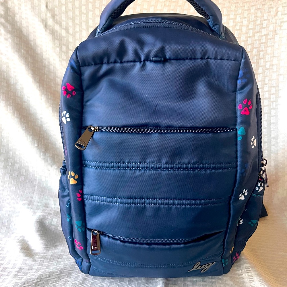 Lug Hopper backpack in Navy paws print
